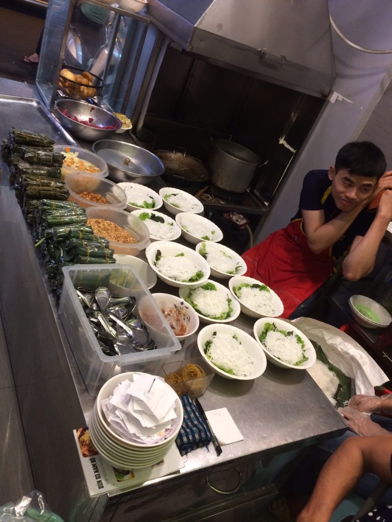 Bún bò assembly line at Bún bò Nam Bò in HanoI