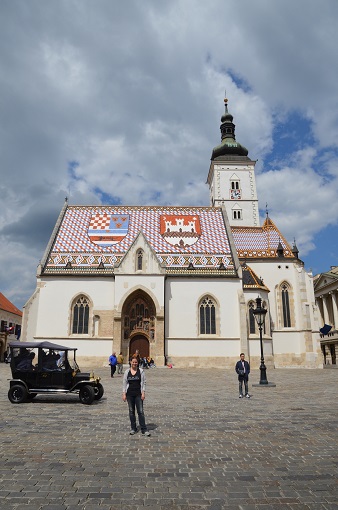 White building with red and blue tiled roof: St. Mark's Church in Upper Town Zagreb