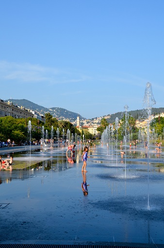Children playing in fountains by the Promenade du Paillon in Nice