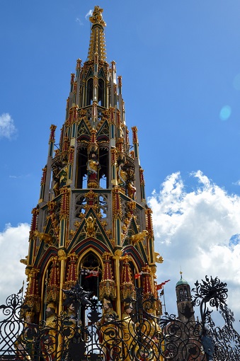 An ornate golden fountain, Schöner Brunnen in Nuremberg