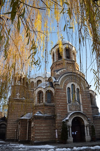 A red brick domed church, the Church of Sveti Sedmochislenitsi in Sofia