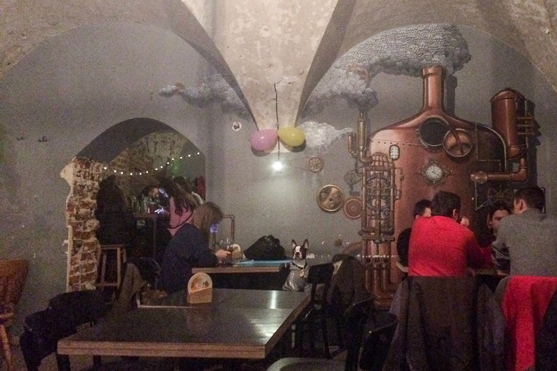 People and a dog inside Marynka Beer Aperitivo, a great place to drink craft beer in Wroclaw