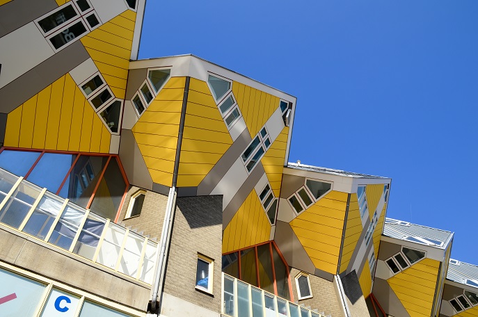 Yellow and white Cubic Houses against a blue sky in Rotterdam