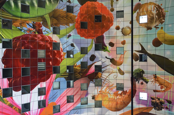 Mural of berries and shrimp inside the Rotterdam Markthal