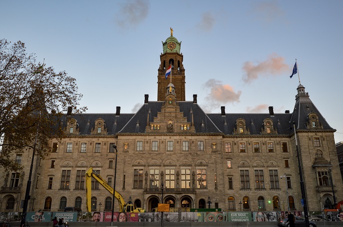 Facade of the impressive Rotterdam City Hall, with a crane outside