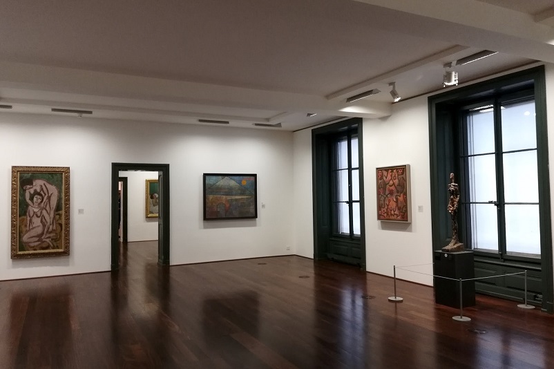 Bern Kunstmuseum interior showing paintings and one sculpture, Switzerland