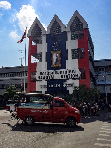 Red, white, and blue Hat Yai train station where we took the train from Thailand to Malaysia