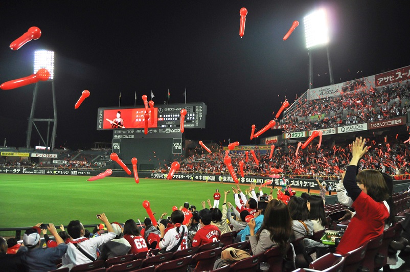 People celebrating at a baseball game in Hiroshima, Jjapan