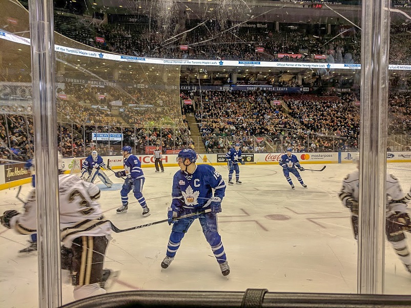 Ice hockey game in Toronto, Canada as seen through the glass