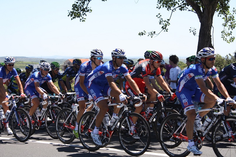 Cyclists - most in blue jerseys - in the Tour de France
