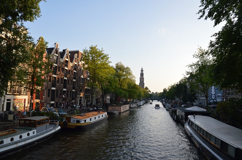 A canal lined with house boats in Amsterdam, the Netherlands