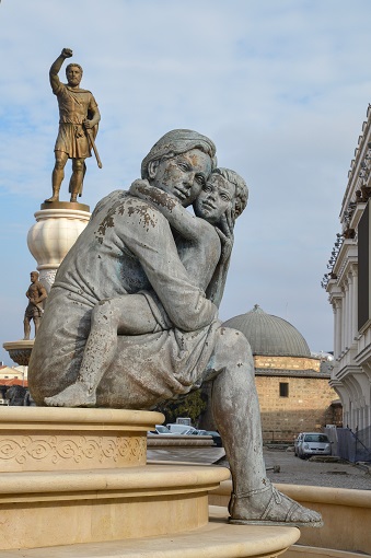 Enormous sculpture of a woman hugging her child, the Olympias statue in Skopje