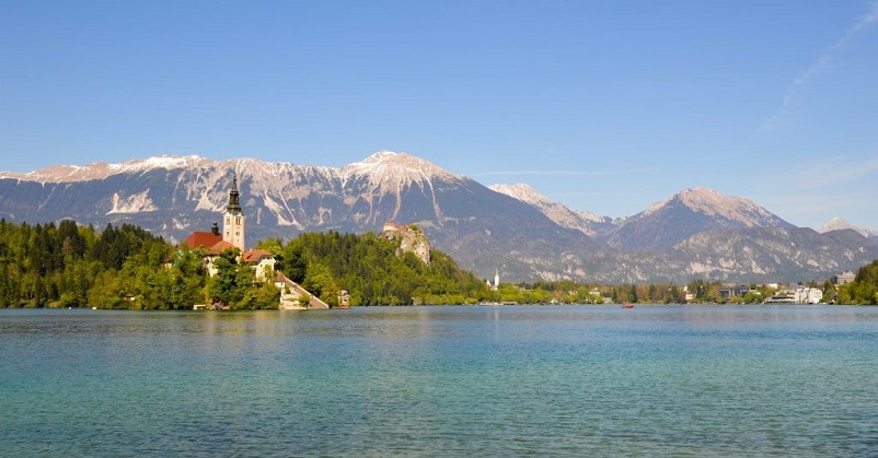 View of Lake Bled, Lake Bled Island, and mountains in the background in Slovenia