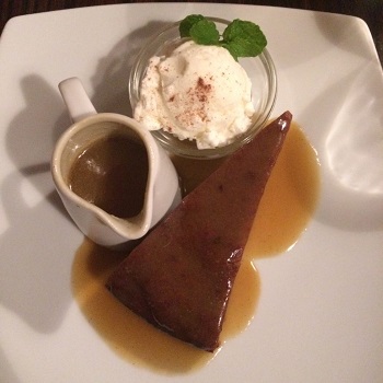 Sticky toffee pudding on a plate at Shawtys Cafe in Twizel, NZ