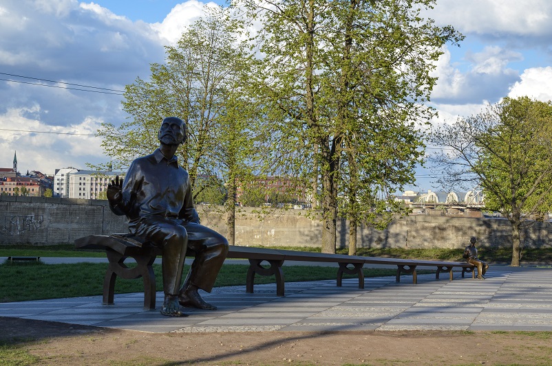 Sculpture of two men on a bench outside the National Library of Latvia in Riga
