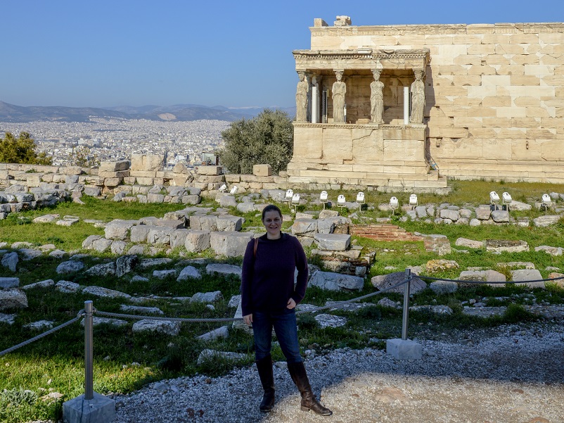 Sarah standing in front of the Erechtheion on the Acropolis in Athens, Greece