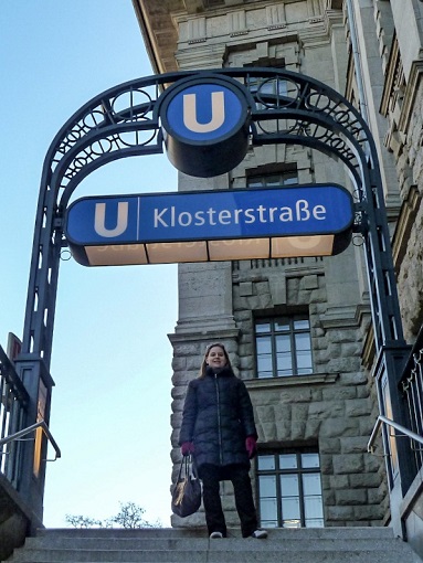 Sarah standing under an U-Bahn sign in Berlin