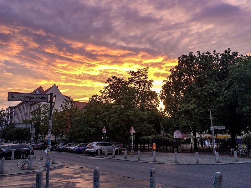 Colorful sunset on a street corner in Berlin