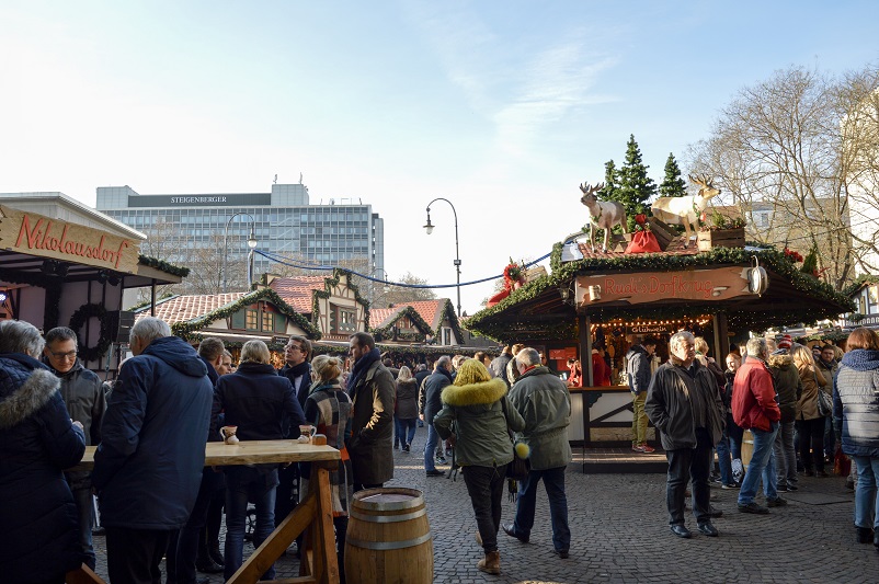 People enjoying themselves at one of the Cologne Christmas Markets