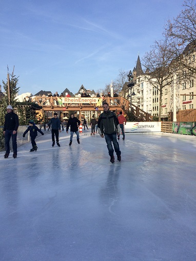 Justin ice skating at a Cologne Christmas Market