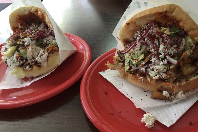 Two Doener Kebabs on red plates in Berlin