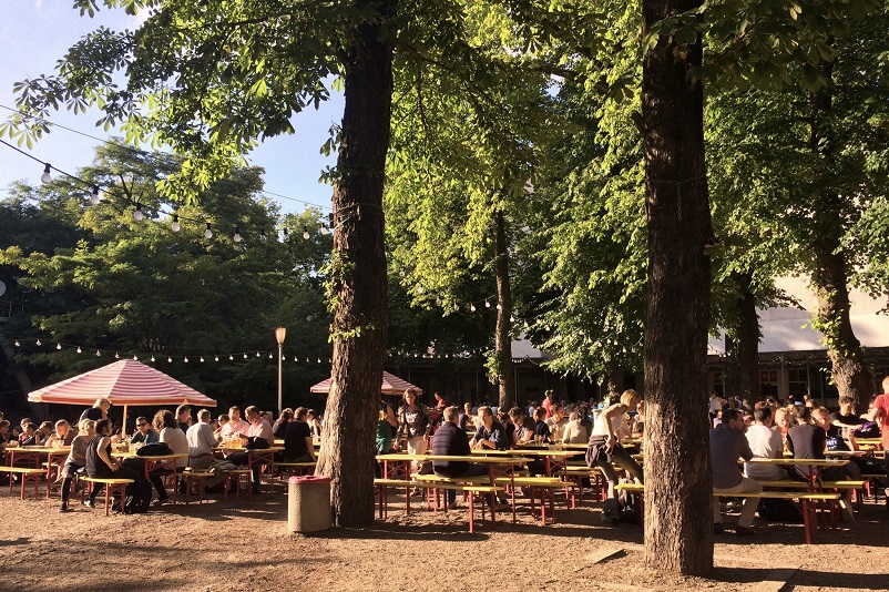 People sitting at a beer garden in Berlin