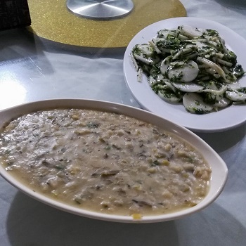 Bowl of beans and plate of glutenous rice and veg on a Shanghai food tour