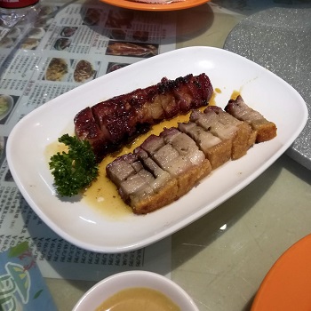 Plate of two types of pork on Shanghai food tour