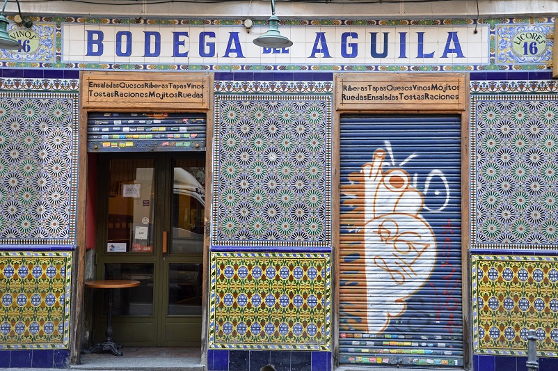 Beautiful tiled wall in Madrid with words saying "Bodega Aguila"