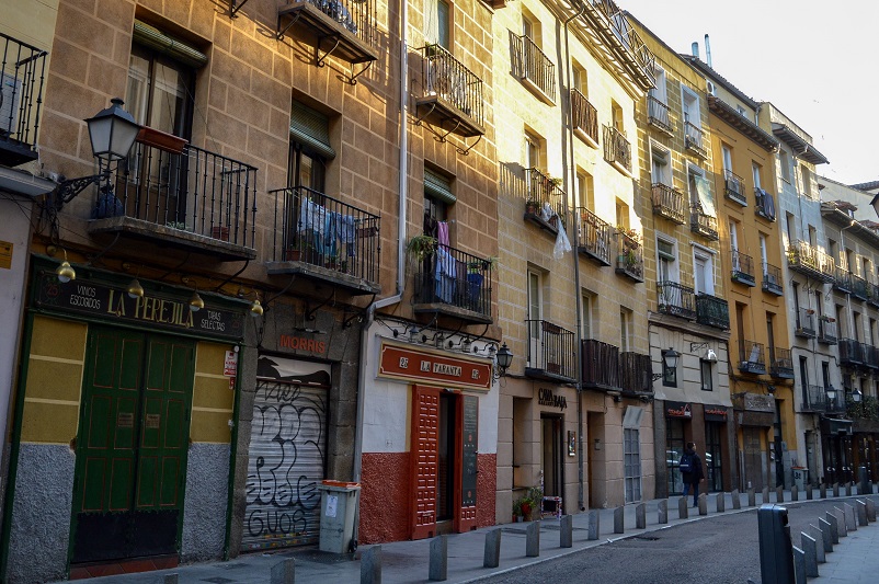 Street in Madrid with buildings in orange tones