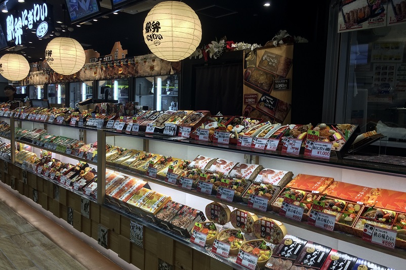 Shelves of ekiben, prepared food to take on the train in Japan
