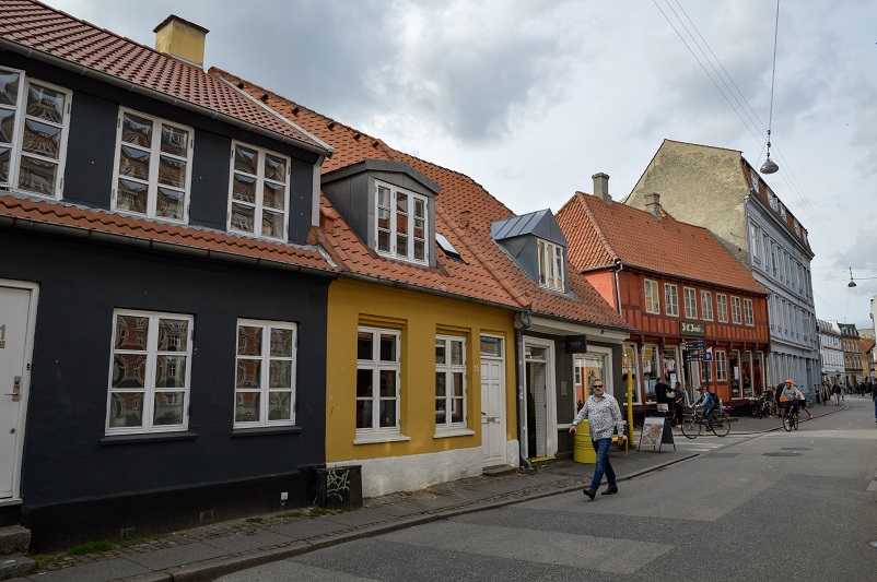 Street with small colorful houses in the Latin Quarter of Aarhus