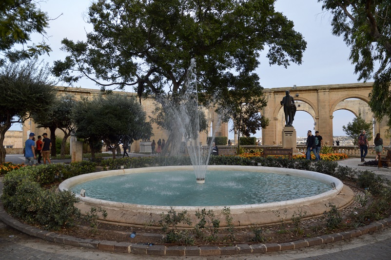 Fountain in front of a tree at Upper Barrakka Gardens, one of the things to do in Valletta