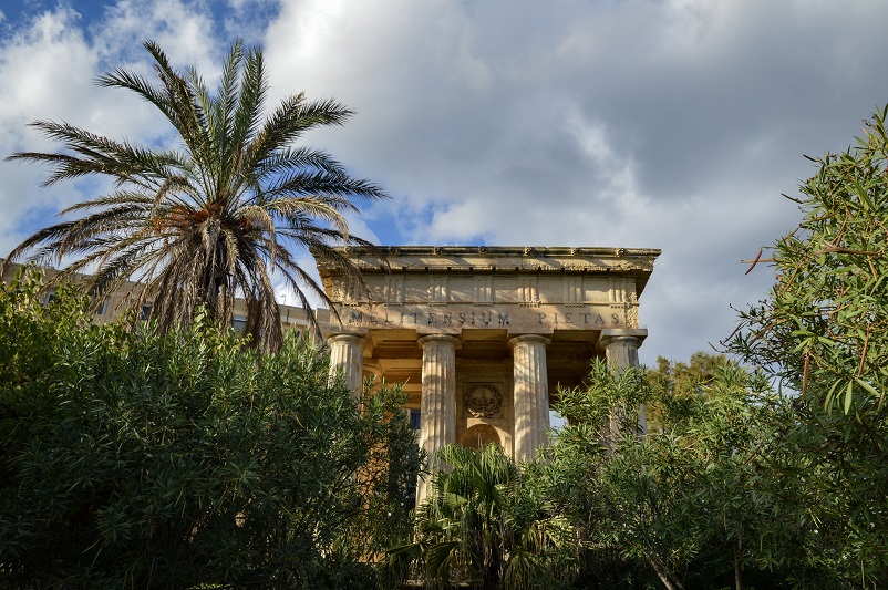 Temple surrounded by trees in Lower Barrakka Gardens in Valletta
