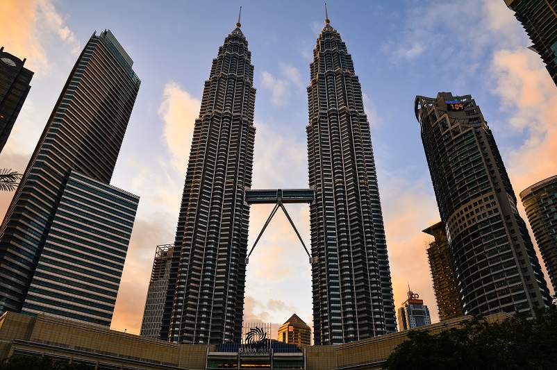 Petronas Towers at sunset in Kuala Lumpur, Malaysia
