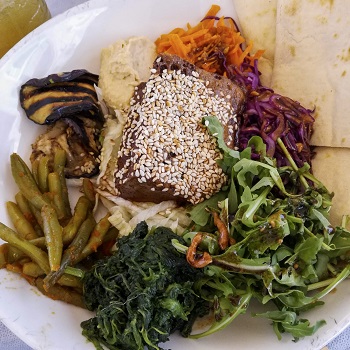 Bowl of veggies, tofu, and Maltese bread at Soul Food, one of the best Valletta restaurants