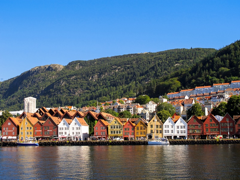 View of colorful houses in front of green in Bergen, Norway