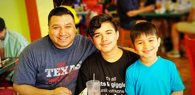 A man with two boys, Maria's family
