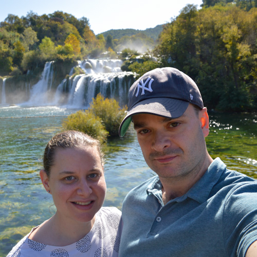 Sarah and Justin in front of a waterfall in Croatia